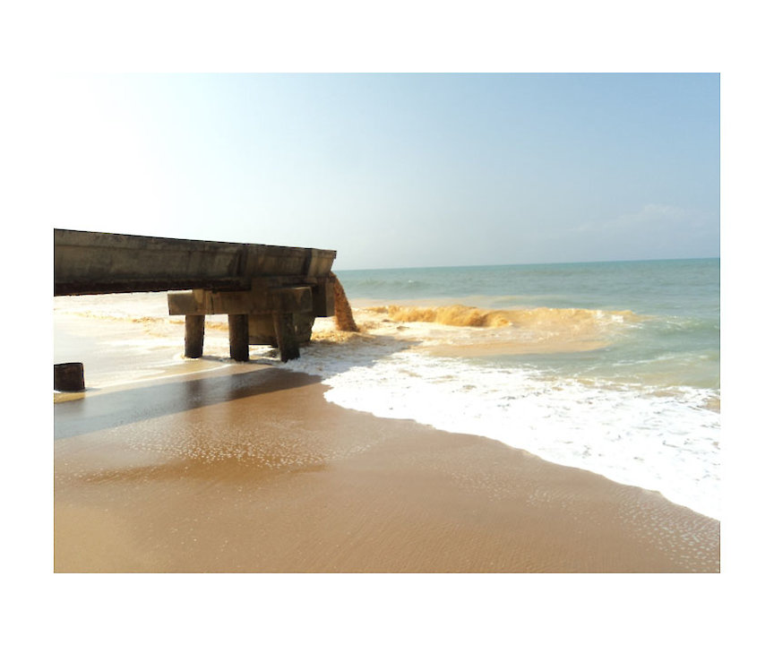 Phosphate mine tailings being dumped into the sea, Togo